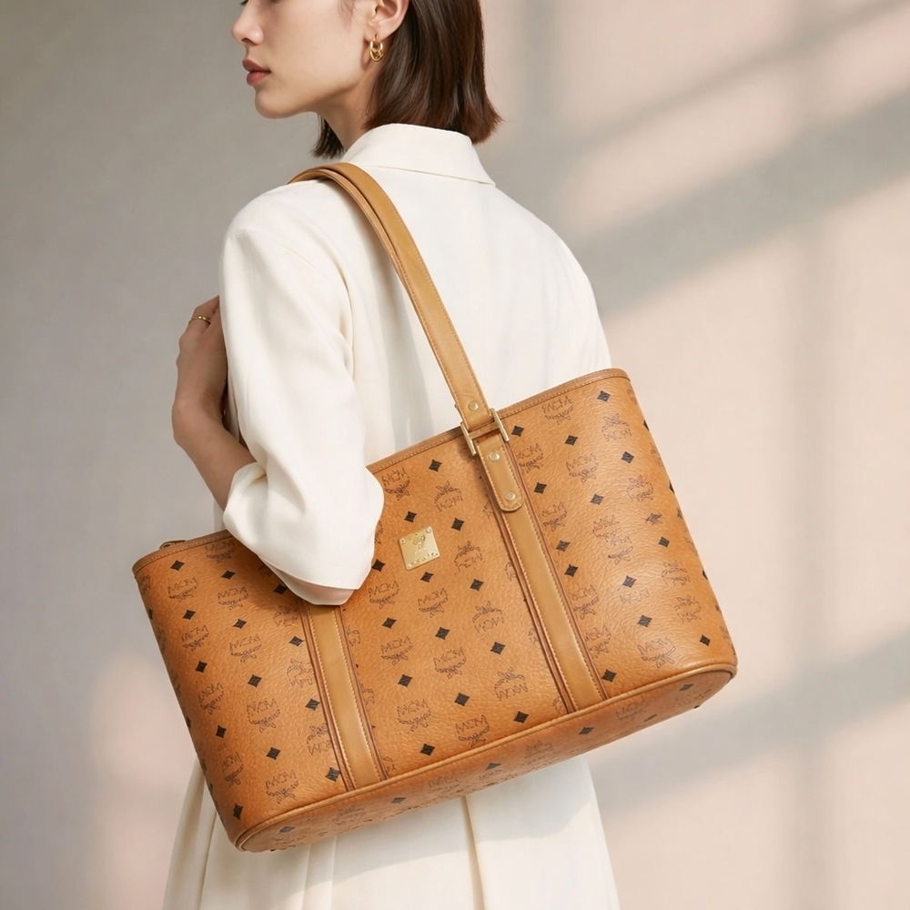 MCM Tan Leather Tote with Iconic Pattern and Sturdy Handles